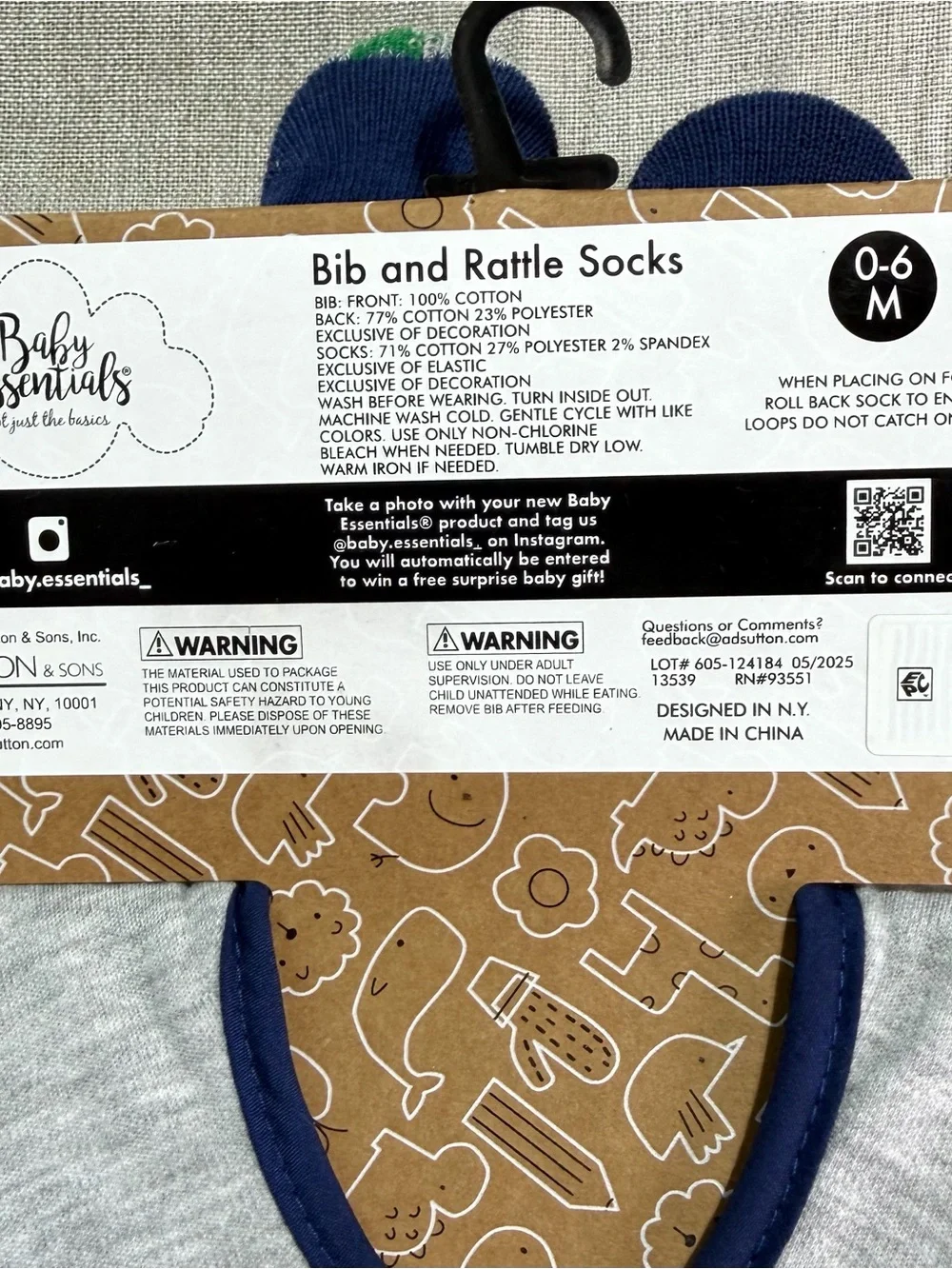 Baby Essentials 2-piece set ‘New to the Team' Grey Bib and matching rattle socks